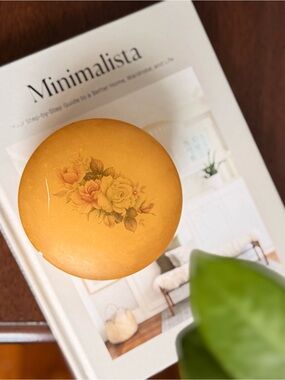 Vintage hand-painted alabaster trinket box with floral design.
